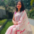 The-Power-Drape-Why-Off-White-Cotton-is-the-New-Standard-for-Formal-Wear-Sarees-beauty-and-fashion-freaks-pink-in-white-base-linen-saree-1